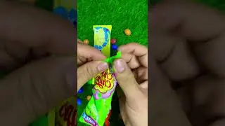 Chocolate & Lollipop Unboxing ASMR 🍫🍬 So Satisfying! #Shorts  #asmrcandy #asmrlollipopcandy