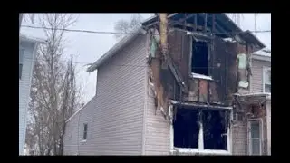 Two people rescued, one arrested following house fire in Jackson