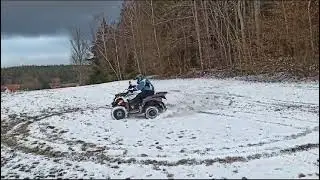 Donut's with atv on the snow with my dog