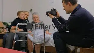 Taking photos with elderly grandma