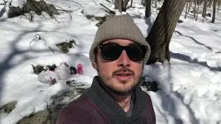 Winter camping in the snow and roasting Cornish hens over a fire