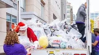 Santa Packs the Truck with Gifts to Deliver to Kids in Need
