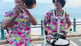 Trombone version of the &ldquo;Panther Panther Theme&rdquo;, played along with two drummers