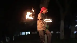 Fire spinning on a Slackline