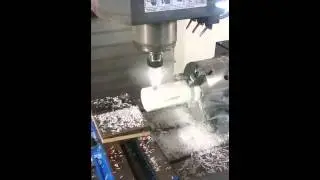 Plastic Machining - Milling Side Slots into Delrin Component by PlasTex Precision Manufacturing