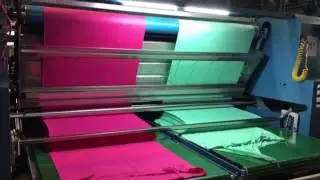 Heat setting machine for tubular knit fabric (