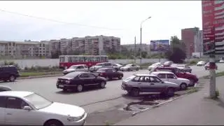 Watching the trams on Ulitsa Marshala Jukova in Omsk 10 July 2009