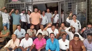 Private bus operators protest outside Transport Department, Panaji over pending demands.