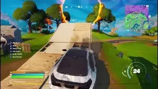 In a Vehicle, Jump Through the Flaming Ring at Salty Springs Location - Fortnite