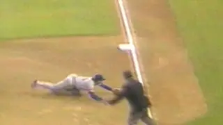 Molitor dives, fires to first for the out