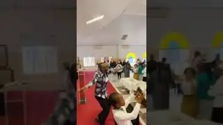 Minister Spokes sings at Anglican Church
