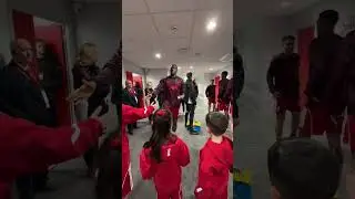 Liverpool players personally greeting the mascots before warming up ❤️