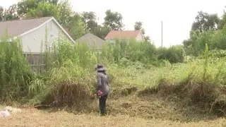 Fifth Ward citizen steps up to mow overgrown lot after years of city neglect