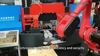 Band saw with robotic arm makes cutting simpler.