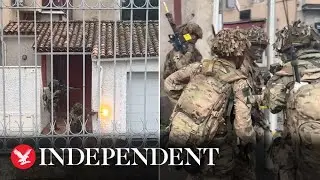 Gunshots ring out as British soldiers take over French town for combat exercise