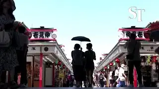 Tokyo residents save power amid record heatwave