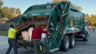 One of Waste Pro&rsquo;s Best Crews Packing Post Christmas Trash into the Evening