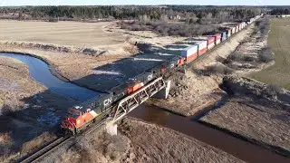 Awesome 4K Aerial View! Long Stack Train CN 120 w/DPU Accelerating pass Nappan, NS