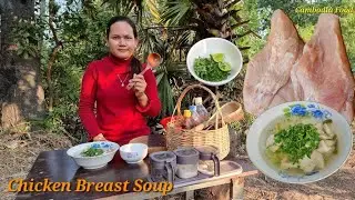 Cooking chicken breast soup with lime and herbs at poor house at Countryside
