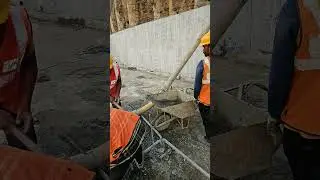 Retaining wall casting, curing compound apply and cleaning to handover