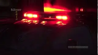 Stock Video: American Ambulance Light Bar Flashing at Night