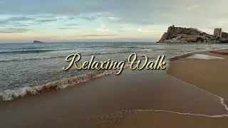 Sea relaxation. Sunset on a sandy beach 4K relaxing video