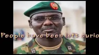 Chief of Army Staff, General Buratai Taking a Selfie with His Pet Snake