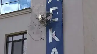 Grenade attack hits Ukraine TV channel set to air Putin documentary | AFP