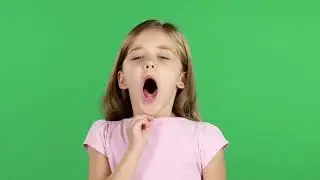 Little girl yawns green screen 4k footage