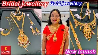 Bridal jewellery in yellow gold with enamel work & natural stone work from Kalyan jewellers, Ranchi