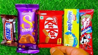 ASMR: Unboxing a Giant Mystery Box Full of Candy chocolate rainbow lollipops Satisfying video