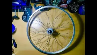 City cycle wheel making twisted spokes.