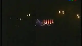 SENTADA AQUI EN...
