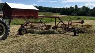 New Holland Rollbar Rakes and Toolbar - Raking Hay