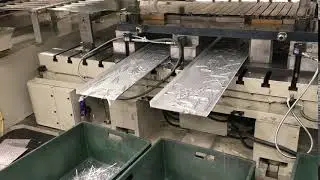 Multi Tray Scrap Conveyor   Pushing the Scrap from the Back to the Front of the press   Front View