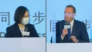 Taiwan's Tsai says will defend freedom, former Aussie PM shows support | AFP