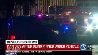 Man dies after being pinned under car carrier in East Windsor