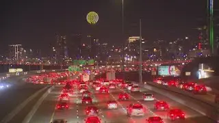 Dallas Police Department responds to a major traffic jam prompted by downtown fireworks