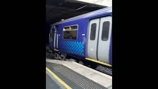 Scotrail Class 318257 departing Cambuslang operating 2L05 Larkhall - Dalmuir.
