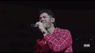 Jonas Brothers performing &ldquo;Burnin&rsquo; Up&rdquo; during the Match For Hope Halftime Show in Doha, Qatar