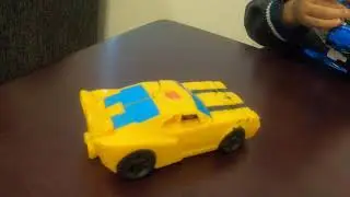 Kid Playing with Transformer Police Car Vs Megatron