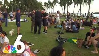 Large police presence as dozens gather drum circle amid new ban in Miami Beach