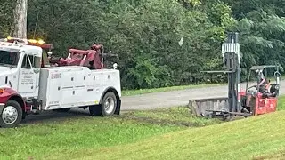 Poor Lowe&rsquo;s driver had a horrible day!!! #winchout #towtruck #stuckinmud #buried #heavyequipment
