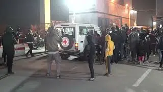 Footage Shows Convoy of Red Cross Vehicles Leaving Gaza With Hostages