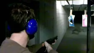 Remington 870 tears a chunk out of target carrier