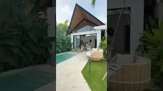 Chic home with white pebbles, sculpted bonsai, & a sleek plunge pool under open skies! #homedesign
