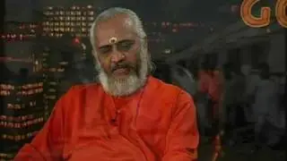 Swami Ramakrishnanda and his Guru Amma the Hugging Saint