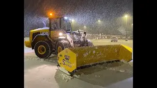 Jcb loader and skid steers with arctic snow pushers