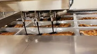 COLIMATIC thermoforming THERA650 with cartoning and dosing system for BBQ Ribs