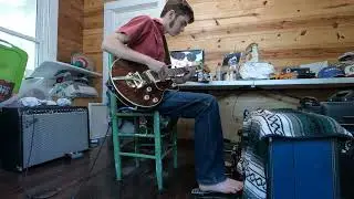 Shakey Graves covers with suitcase kick drum and guitar.